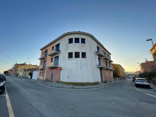 Edifici a De l'escala 1. Terreno con estructura