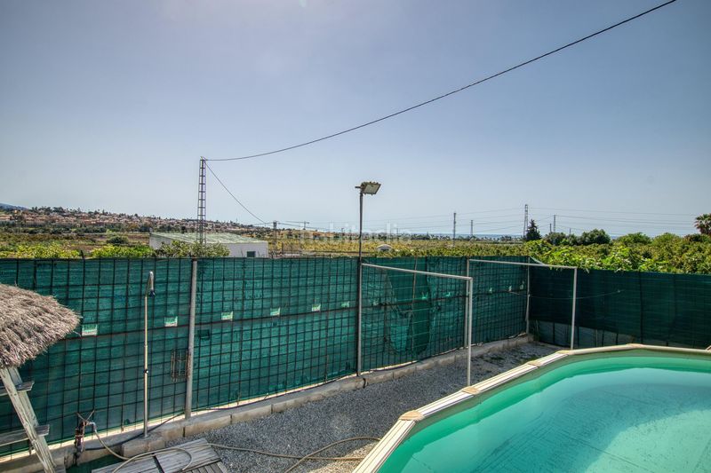 Foto 5ee113f3-8633-415d-86a3-c80e023967a3. Masia amb piscina a Camino Viejo de Málaga Vélez - Málaga