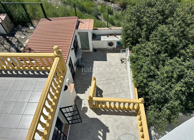 Foto abd7ed41-49ee-4cb0-b7b7-d4c6576e3883. Casa adossada amb piscina a Manilva pueblo Manilva