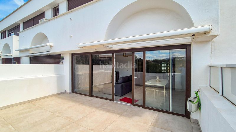 Foto 3e3a60bb-5ae4-4b3e-a0cd-7511d4baf839. Casa adossada amb aparcament piscina a la cala Mijas Mijas