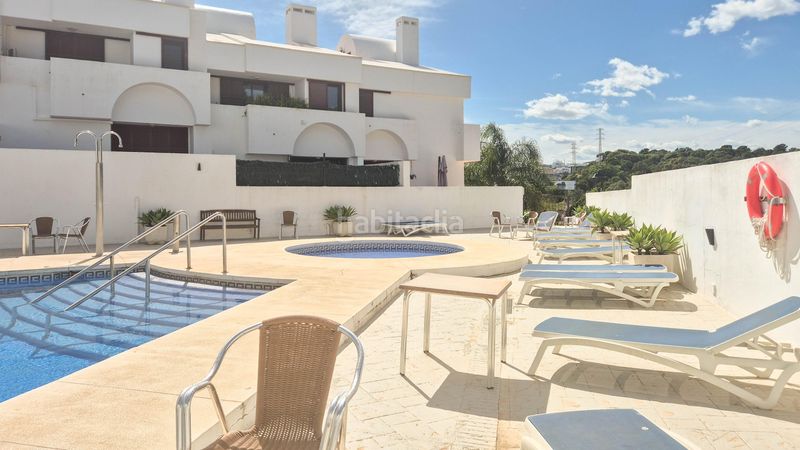 Foto 49e919bc-bf32-4161-b43d-a38e6012916e. Casa adossada amb aparcament piscina a la cala Mijas Mijas