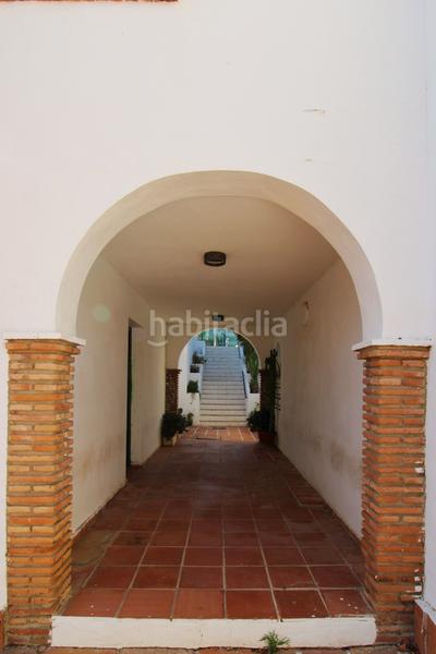 Foto 2c6297fa-c487-4004-a5ce-fc3aff198c20. Lloguer casa adossada amb xemeneia piscina a La Colina Torremolinos