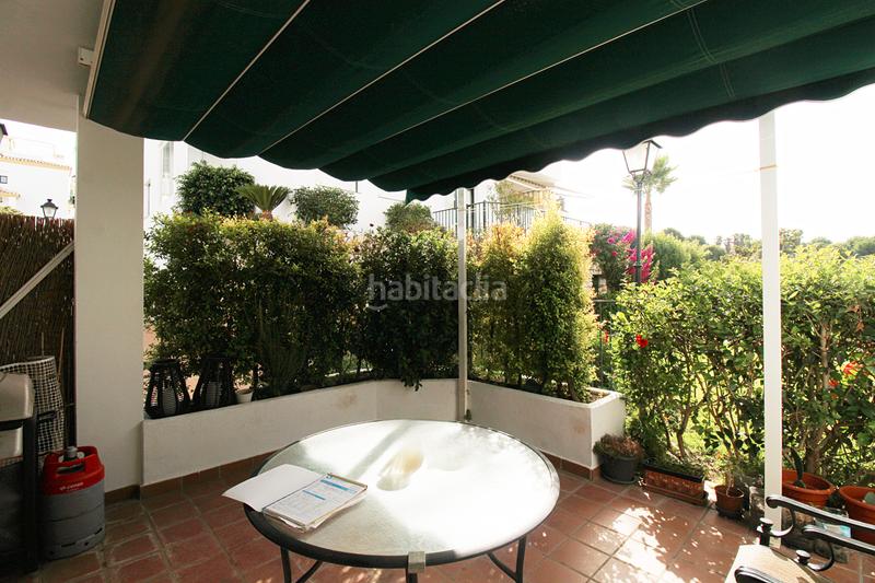 Foto f6449793-b35f-4880-bbee-664413fcd933. Apartamento  en planta baja con terraza acristalada y piscina en Alhaurín Golf en Alhaurín el Grande