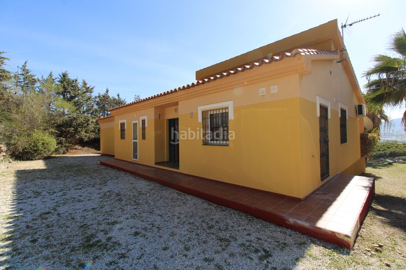 Foto cc62978c-db74-489a-a0fb-114643a482d9. Xalet amb xemeneia calefacció piscina a El Romeral-Peñón de Zapata Alhaurín de la Torre