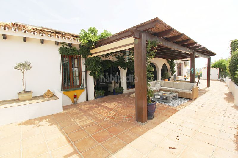 Foto 03721e75-e87d-4988-b32f-3e038e53a66b. Masia amb xemeneia calefacció aparcament piscina a Mijas