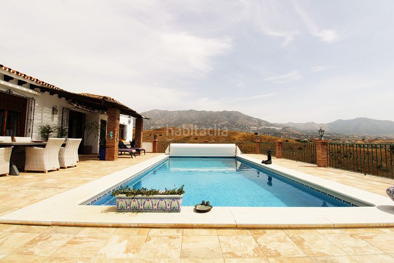 Foto 0cc9b487-7ddf-4572-8a72-d54d2c6b22cd. Masia amb xemeneia calefacció aparcament piscina a Mijas