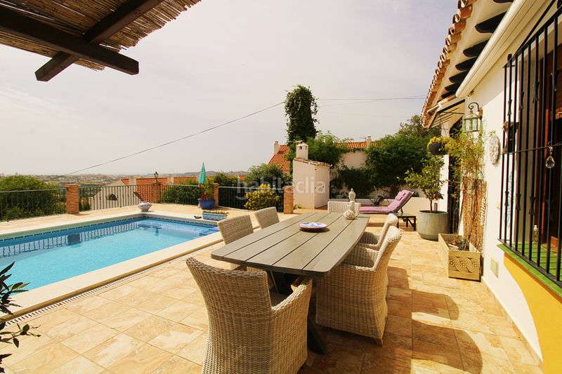 Foto 14ab08e1-2cce-46f5-a0ca-f97362a6bace. Masia amb xemeneia calefacció aparcament piscina a Mijas