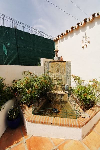 Foto 45f9ae00-b2c2-4d0c-9bd0-3f6c6e2dd31e. Masia amb xemeneia calefacció aparcament piscina a Mijas
