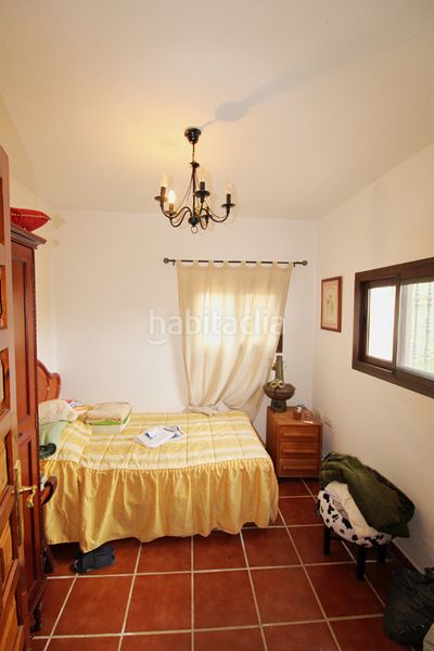Foto 65c54303-c1a6-404d-b703-3d3a6371c7b4. Masia amb xemeneia calefacció aparcament a Alquería-Torrealquería Alhaurín de la Torre