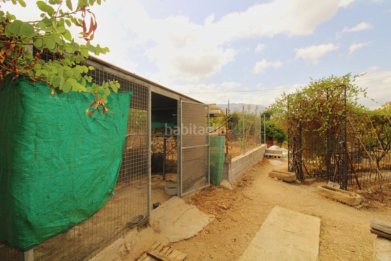 Foto d58ad317-dd63-4a9e-9b3b-d1f743b45c02. Masia amb xemeneia calefacció aparcament a Alquería-Torrealquería Alhaurín de la Torre