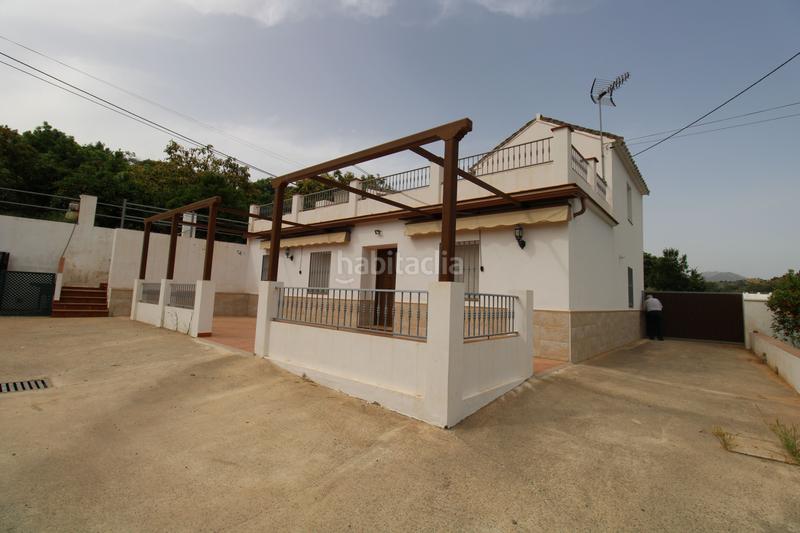 Foto 6c0905bf-c2c3-498a-9de5-b9ee97c32902. Masia amb aparcament a Coín