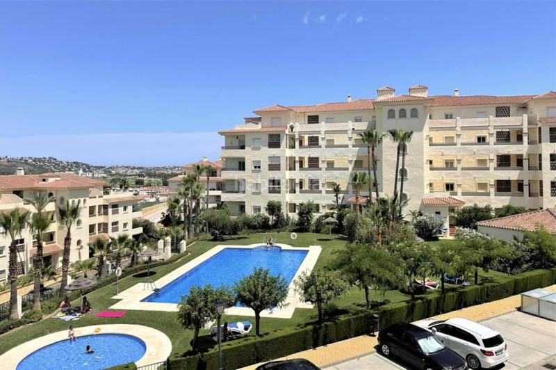 Foto 108d2d4f-d9c5-41f8-8c11-f9ff5b0d385e. Piso bajo en altura con hermosas vistas y cómoda terraza, en la prestigiosa comunidad de la cala hills en Mijas