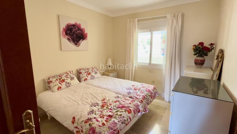 Foto 23b856bc-29c2-41cc-8c01-8e6119b41412. Piso bajo en altura con hermosas vistas y cómoda terraza, en la prestigiosa comunidad de la cala hills en Mijas