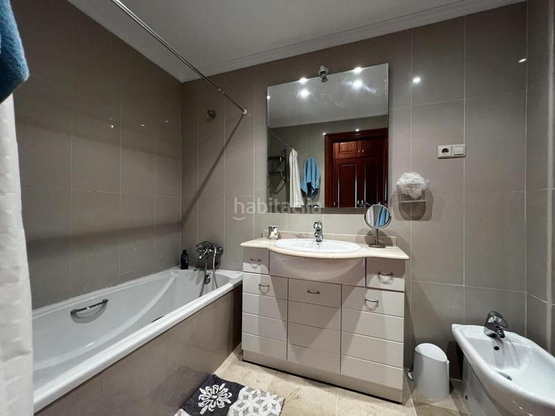 Foto e9755ede-f5cc-4f5e-a02a-593ad219cf11. Piso bajo en altura con hermosas vistas y cómoda terraza, en la prestigiosa comunidad de la cala hills en Mijas