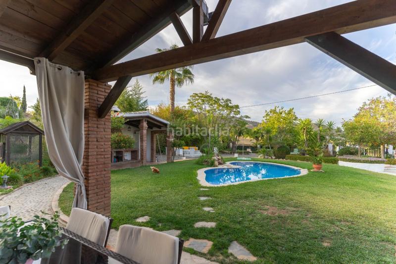 Foto a11574e1-79ec-45d0-8dbe-2988d0f1f860. Chalet 2 chalet independientes con piscina en Centro Alhaurín el Grande