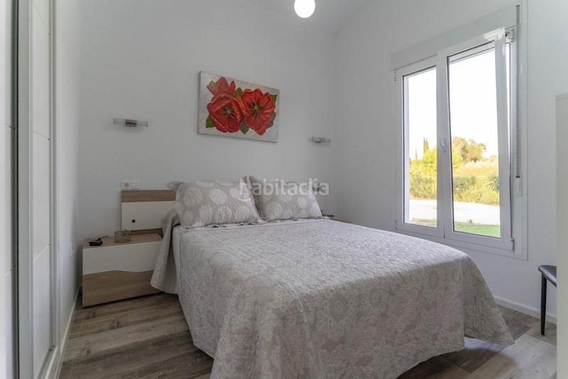 Foto d1097615-5027-4c1d-8a0e-f3f80390af6e. Chalet 2 chalet independientes con piscina en Centro Alhaurín el Grande