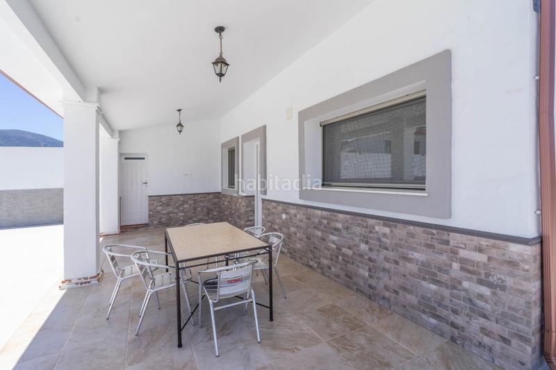 Foto 4a876ff5-c3fe-42aa-8e53-8be5a9684454. Chalet avec parking dans Centro Alhaurín el Grande