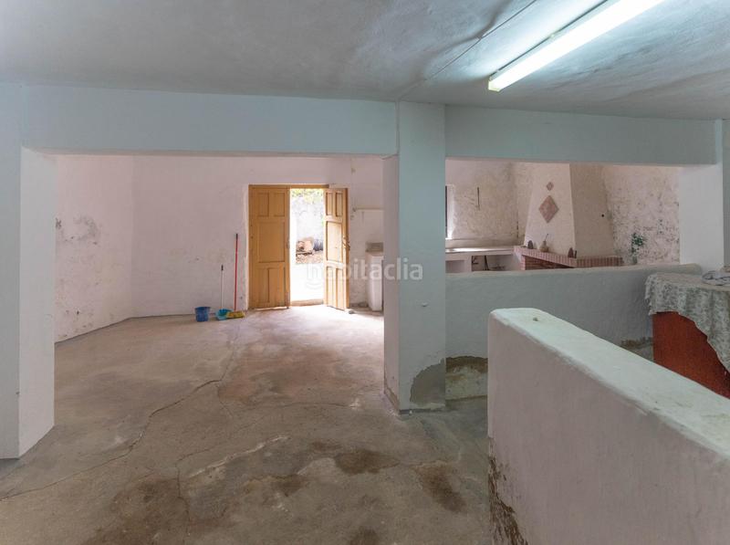 Foto c4fa16a2-c6f2-4e70-8480-71abae178975. Semi detached house in Yunquera