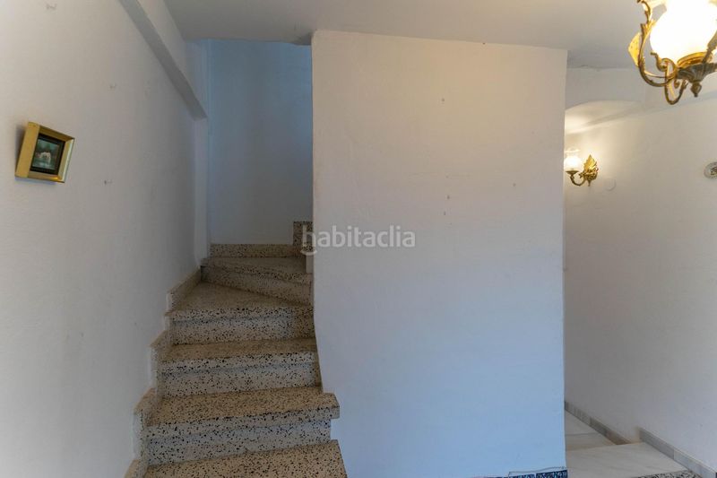 Foto 0c5e56c4-b0f4-44a1-ad08-f9fc14c98048. Casa adossada a Coín
