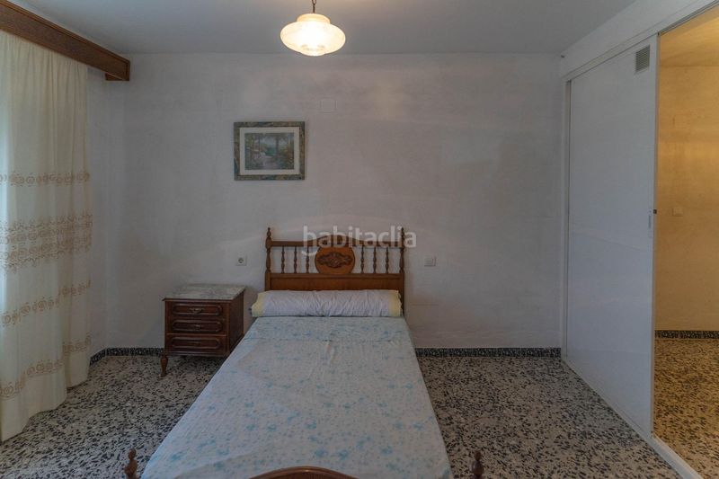 Foto 9494fa6f-443d-459e-a7c7-396e6edd8f8e. Casa adossada a Coín