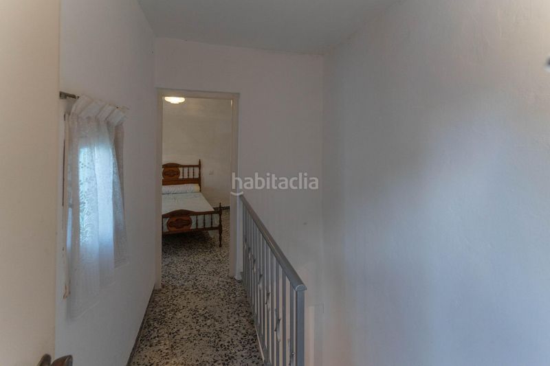 Foto a9aa563b-6cf5-4159-bc01-33d0d02a7d1b. Casa adossada a Coín