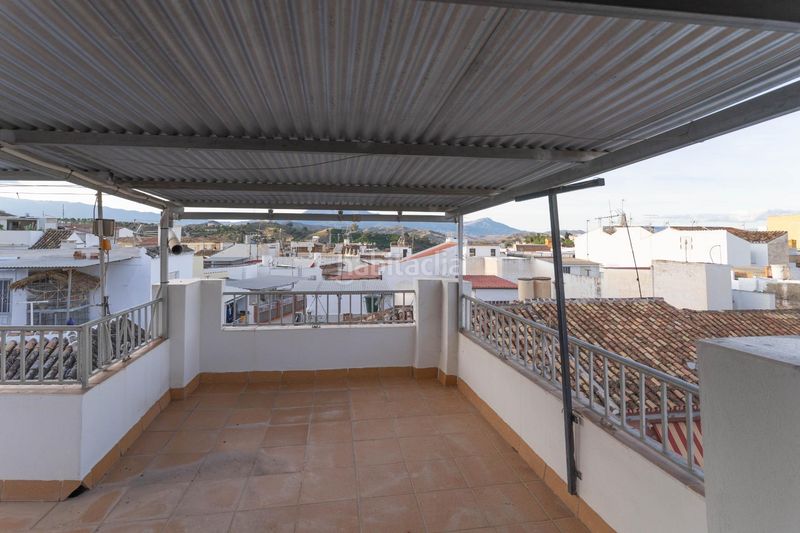 Foto ea47c724-91cb-471b-9bd8-bfbd07f0b7d2. Casa adossada a Coín