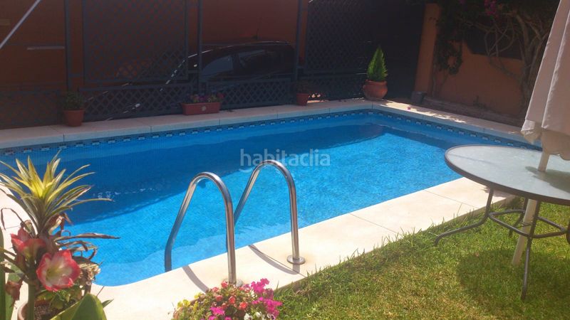 Foto 10589ec3-e8bf-4363-b409-587fd87bda6b. Rent towny house with parking pool in Capellanía - Retamar Alhaurín de la Torre