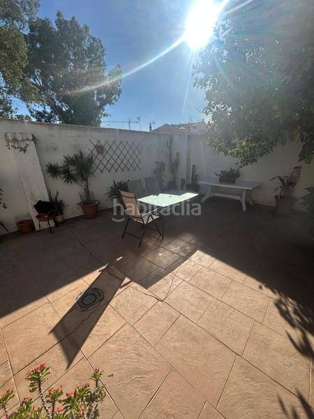 Foto 10b155e0-f07f-42f6-a311-6801e880c83f. Piano terra con camino parcheggio in Santa Isabel Málaga
