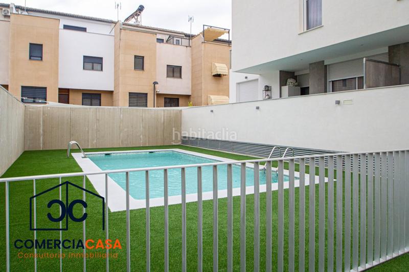 Foto c66451f8-b6ac-49e0-a1b8-feb085a3ac0a. Appartamento con riscaldamento parcheggio piscina in Armilla