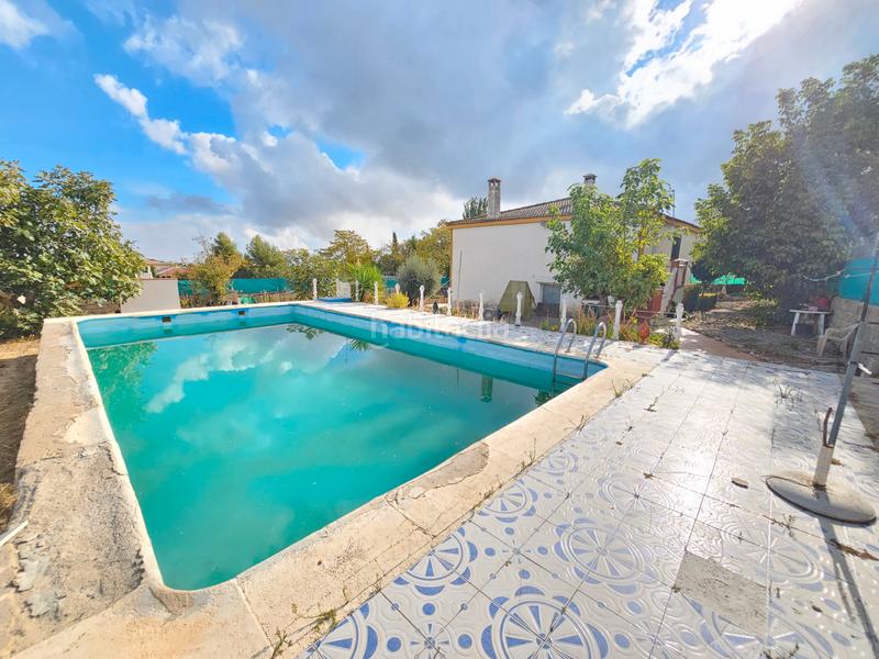 Foto 1986b1d2-a82a-448b-be6c-103e9be770bb. Xalet amb aparcament piscina a Padul