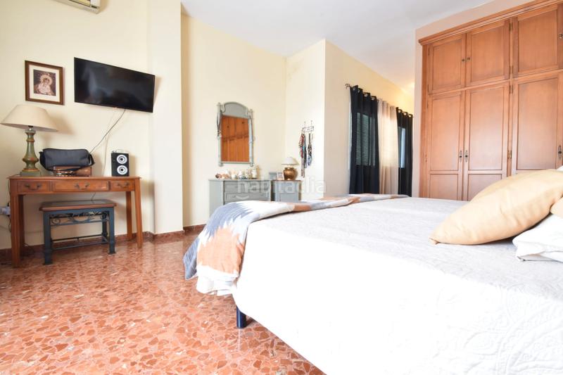 Foto 7bef098b-0e2e-493f-927b-337e426df2e2. Casa adosada casa en calle bailén en Los Molinos Alcalá de Guadaira