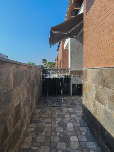 Foto 56b6f971-5fe5-4173-9880-1170e635f913. Casa adossada amb calefacció piscina a Torreblanca Sevilla