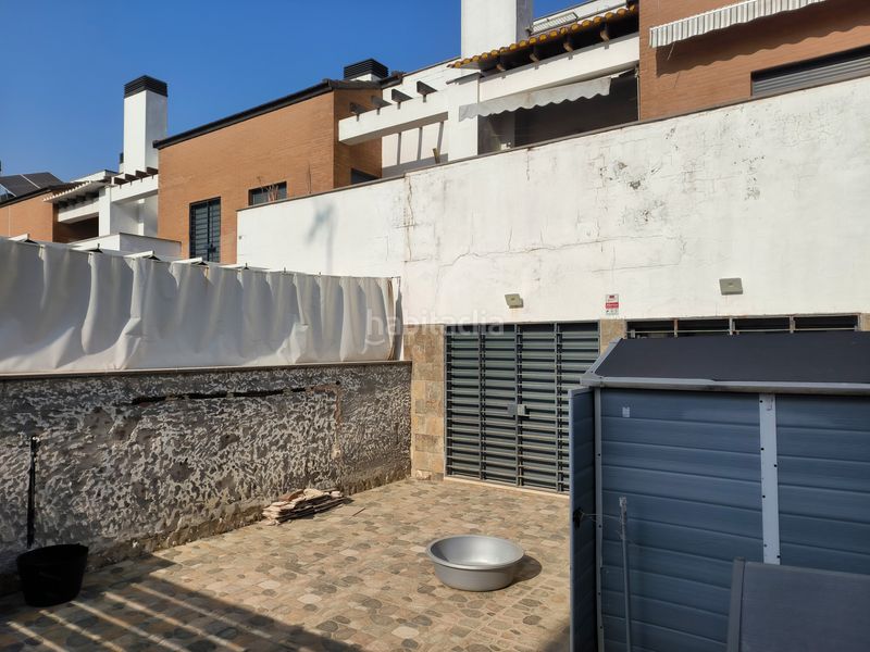 Foto c35e13a6-e182-483c-a621-ceca6013655d. Casa adossada amb calefacció piscina a Torreblanca Sevilla
