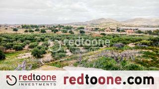 Terreny residencial a Jubalcoi. Terreno en venta con vivienda y árboles frutales