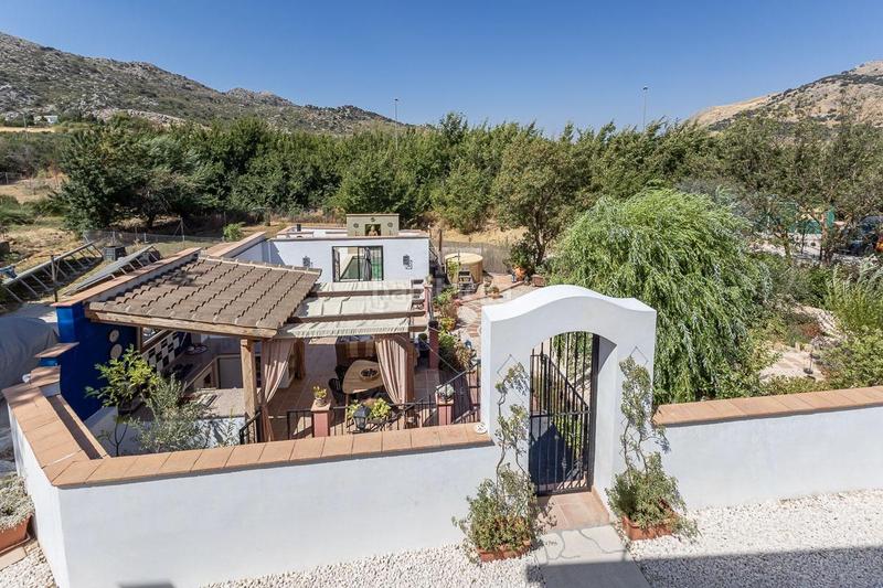 Foto 8a2e312a-b9b3-4815-861c-866eaa99b489. Xalet amb piscina a Loja