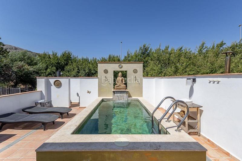 Foto e605a52f-026b-49d5-a44f-00fe03d99c1b. Xalet amb piscina a Loja