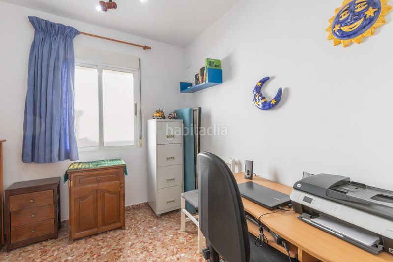 Foto bad8dbe0-ed01-4227-9ad7-0104c61efe44. Casa adosada precioso adosado con patio, terraza, cochera y estufa de leña en las gabias granada en Gabias (Las)