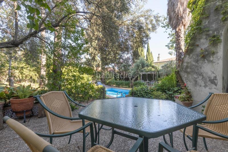 Foto 7609062d-cfae-4b7a-9531-82d6067b615d. Chalet magnifico chalet con amplios jardines y piscina en cortijo del aire! en Albolote