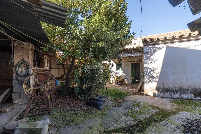 Foto 1ae2a3c1-1529-4edf-ac15-df90755c4de1. Masía en calle gardenia (chaparral) 4 vivienda con múltiples opciones en Albolote