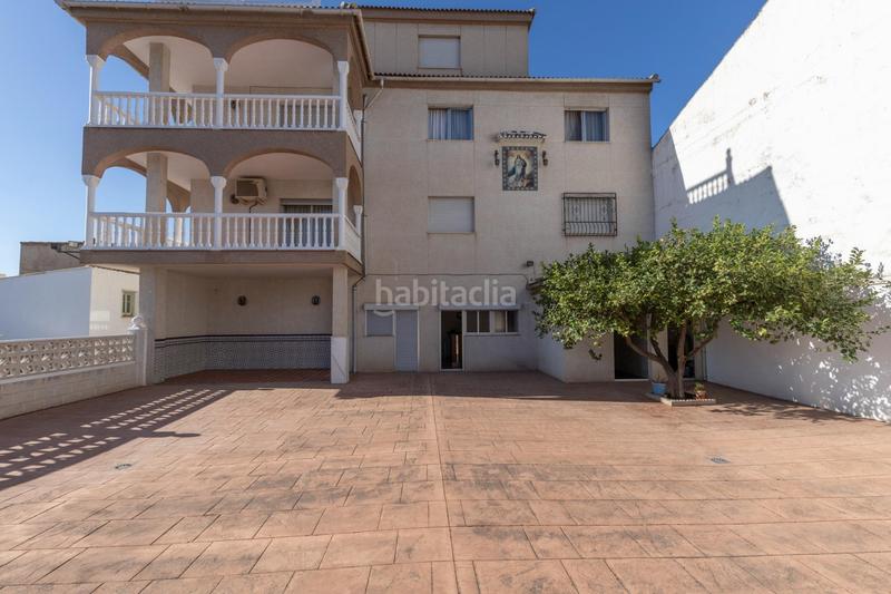 Foto 04284af5-273d-4642-8f43-44e123eb16a0. Casa aparellada amb aparcament a Jun