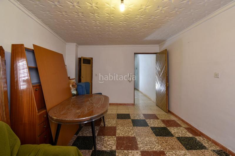 Foto 81a0dae4-fa56-4cf6-aba6-bf0de4311443. Casa amb aparcament a Maracena