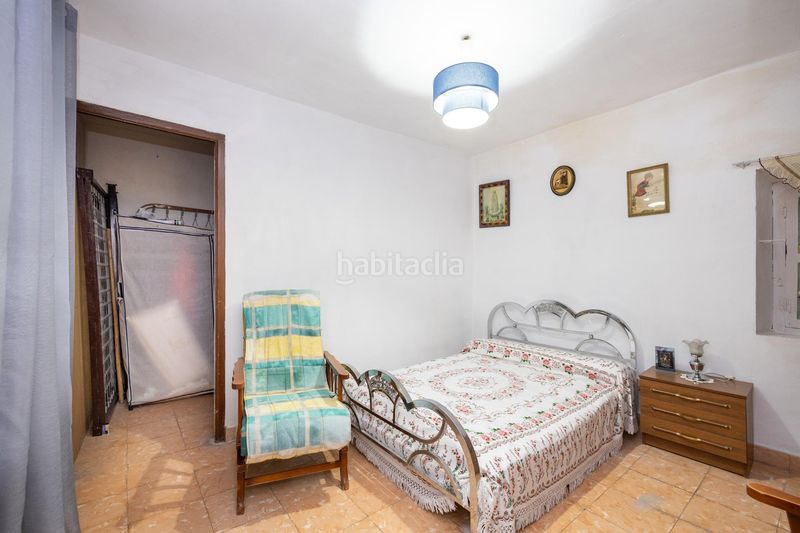 Foto f80f8308-4968-4474-be65-43e4ee7393bf. Casa amb aparcament a Atarfe