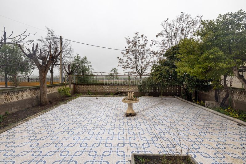 Foto d0fca1f7-878a-4f02-a39b-8e5fd5a14337. Casa amb aparcament a Atarfe