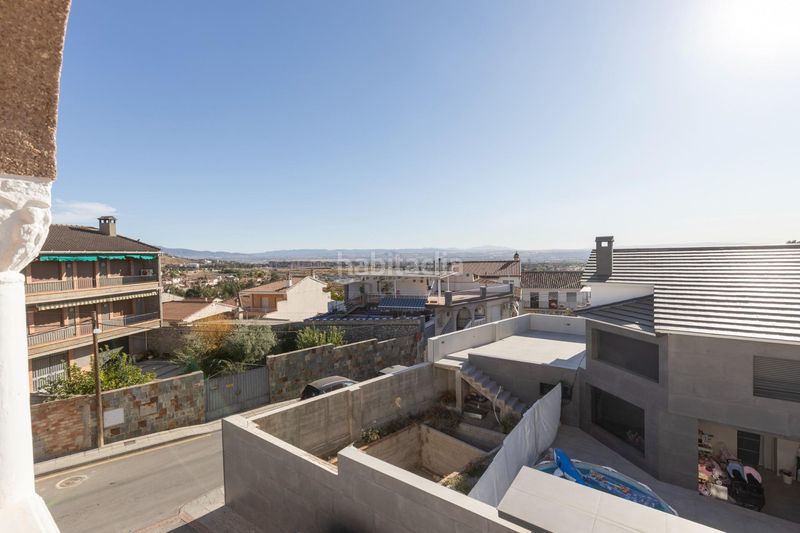 Foto bf074fce-43ec-4f81-a1c2-f02886a5341c. Casa aparellada amb aparcament a Jun