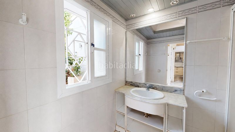 Foto f5f1fbaa-f38d-4f19-8dfb-ae9472cb6a35. Casa adossada amb calefacció aparcament piscina a Mijas