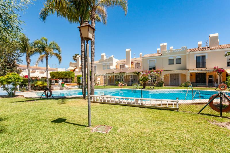 Foto 58934f6b-4ac2-4682-85e1-88788edefc59. Casa adossada amb aparcament piscina a Vera playa naturista Vera