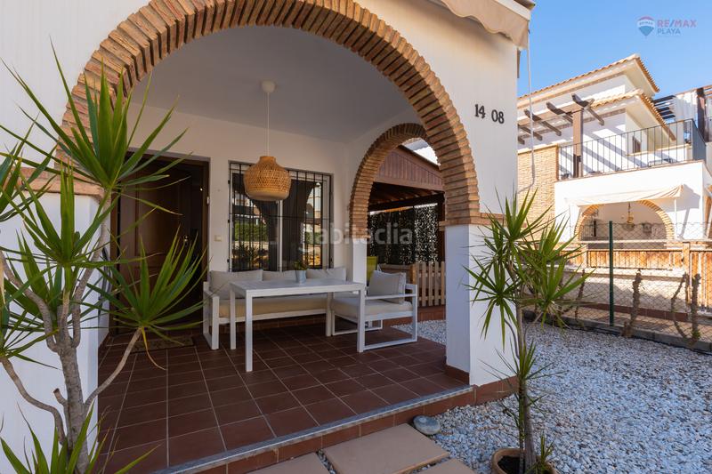 Foto fd4ff725-f577-47e7-87e6-387fc72d2630. Casa adossada amb aparcament piscina a Las Salinas Vera