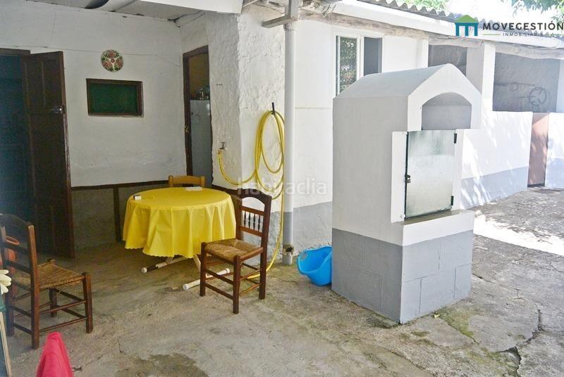 Foto ce89f06a-f010-4813-9a36-552e260af072. Casa amb aparcament a Villaluenga del Rosario