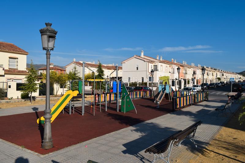 Foto 19cf7fe6-a7ba-4365-b47e-b9ab19a6d7af. Casa adosada  en arenal con sótano y barbacoa en Ronda