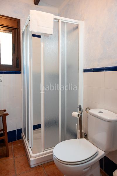 Foto cf2e5fae-e69e-4536-b14d-6ce76f0bd449. Masia amb xemeneia aparcament piscina a Montejaque